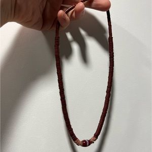 Rust red African necklace with center accent bead and barrel clasp